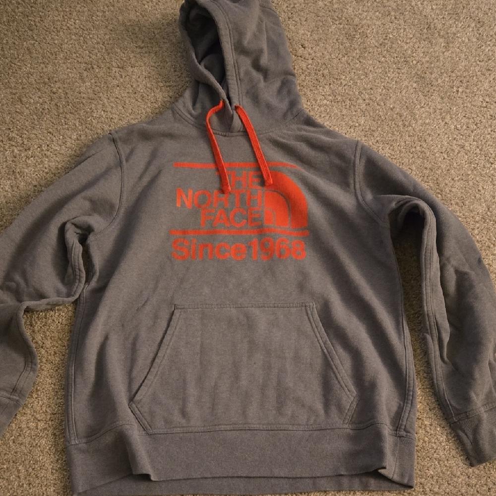 The North Face Charcoal Hoodie with Vibrant Red Logo